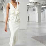 White evening dress with drapery