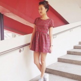 Red dress in a cage with sneakers