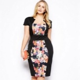 Sheath dress combined from black and colored fabric for full