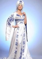 Wedding dress in Russian style with blue embroidery