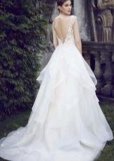 Wedding dress with train from the hemline
