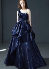 Fluffy evening dress with a single strap