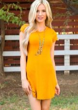 Blonde in mustard dress