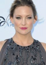 Eye makeup under a gray dress