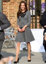 Gray dress of medium length with a skirt Kate Middleton's sun