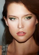 Green shadows under a gray dress