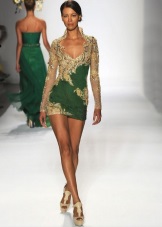 Green dress in combination with gold color