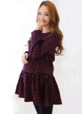 Blue maternity dress with a red pattern