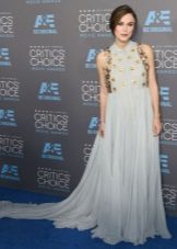 Long pale blue dress on the floor for pregnant women