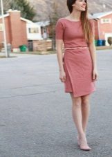 Sheath dress with an asymmetrical bottom skirt