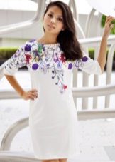 White polyester dress with a print at the top