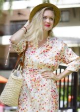 Hat and bag from straw to a staple dress with a small print