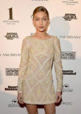 Dress of direct gabardine silhouette with embroidery