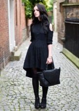 Shirt dress with an asymmetrical bottom at the skirt