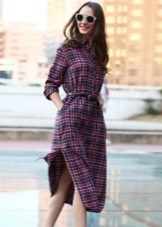 Checkered shirt dress with a belt below the knee and with slits on the sides