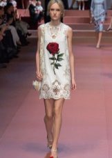White dress with roses and perforation on the bottom of Dolce & Gabbana