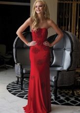 Red dress with a train and open shoulders