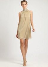 Festive short beige dress with sequins