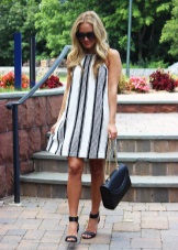 Dress with black and white vertical stripes
