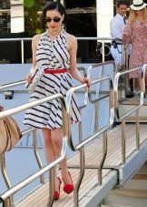 Red accessories for the dress in a diagonal black and white stripes