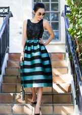 Striped dress with a monophonic top and a striped bottom