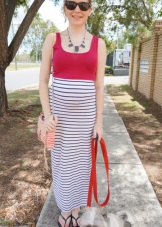 Long dress with a pink top and a striped skirt