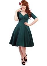 Vintage green dress in the style of the 50s