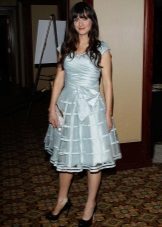 Dress in the style of a new bow of soft blue satin