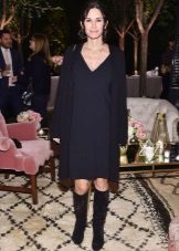 Black straight casual dress with a v-neck at the neck