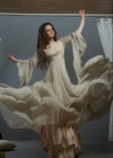Flared beige dress is long to the floor with original sleeves