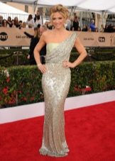 Asymmetrical dress with a red carpet