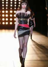 Boots under a leather dress