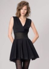Short black dress with a skirt the sun