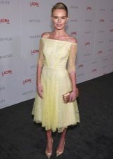 Yellow lace dress with mid-length skirt