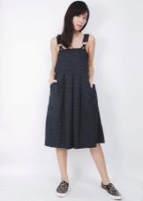 Dress sundress with a loose skirt on the naked body