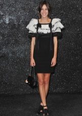 Dress in the style of the 80s with wide shoulders short