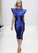 Dress in the style of the 80s with wide shoulders satin