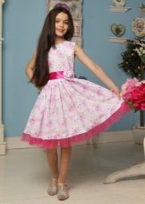 Elegant dress for girls of 8-9 years with a print