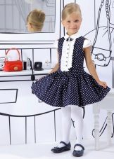 Elegant blue dress with white polka dots for girls