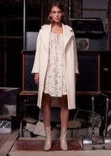 coat to a white short lace dress