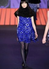 Black pantyhose in a blue dress