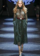 Green dress with a brown belt