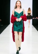 Green dress with a red cardigan