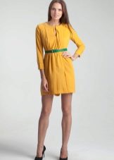 Green belt to yellow dress