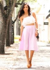 Top with frill in combination with a half-skirt for girls with a figure like Pear