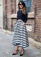 Wide top in combination with a long skirt for girls with figure type Pear