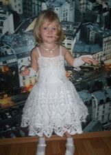 New Year's knitted dress of the Snowflake for the girl