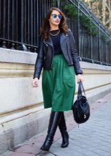 Skirt below the knee in combination with boots