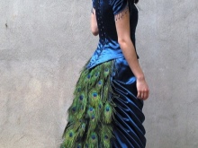 Wedding dress decorated with peacock feathers