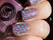 Purple with green manicure under a purple dress